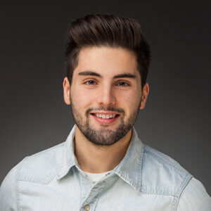 Young man smiling into the camera